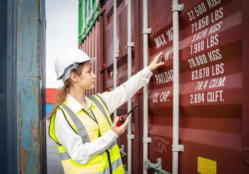 woman-foreman-smile-using-walkie-talkie-front-cargo-forklift-warehouse-manager-white-helmet-safety-supervisor-container-custom-terminal-port-concept-import-export